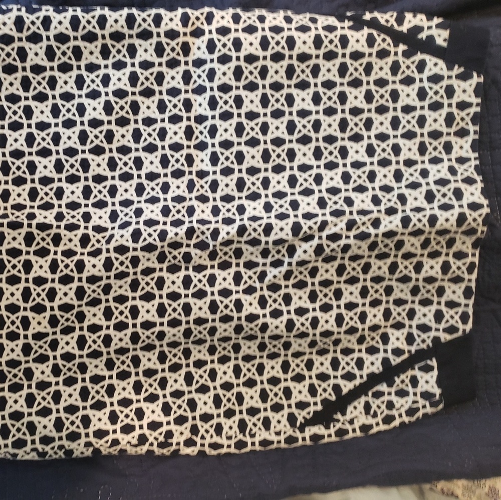 The limited navy and white skirt
